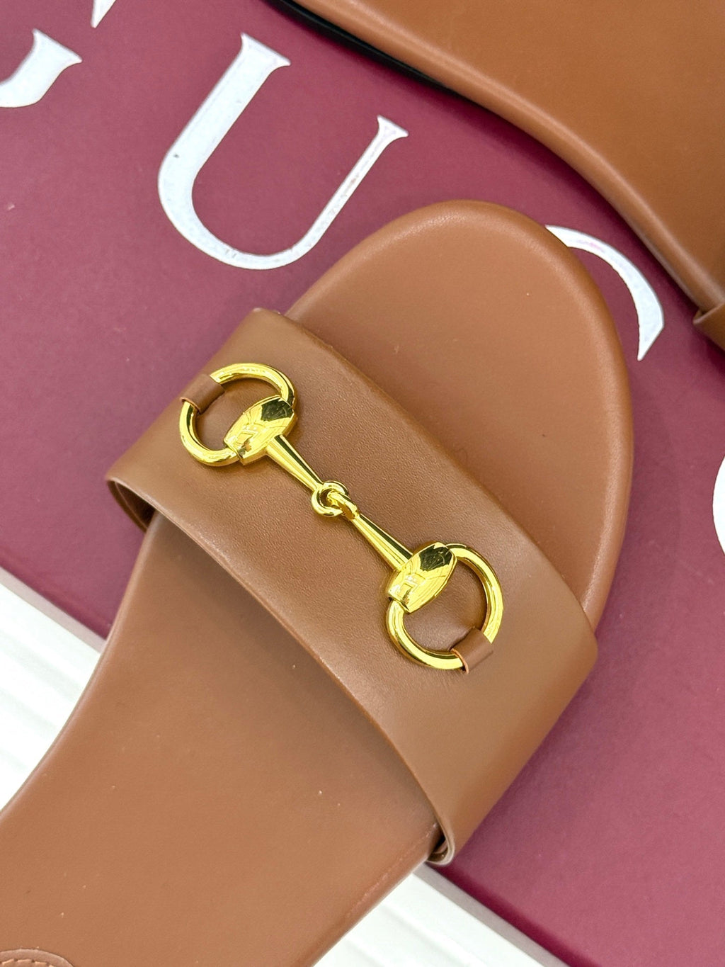 SLIDE SANDALS IN BROWN CALFSKIN WITH GOLD HARDWARE